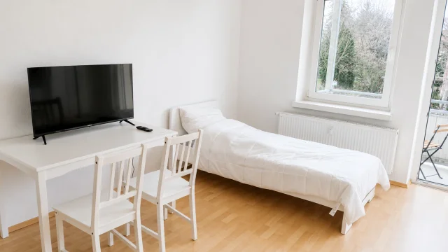 Weißenfels 3 - Schlafzimmer 1 Fernseher